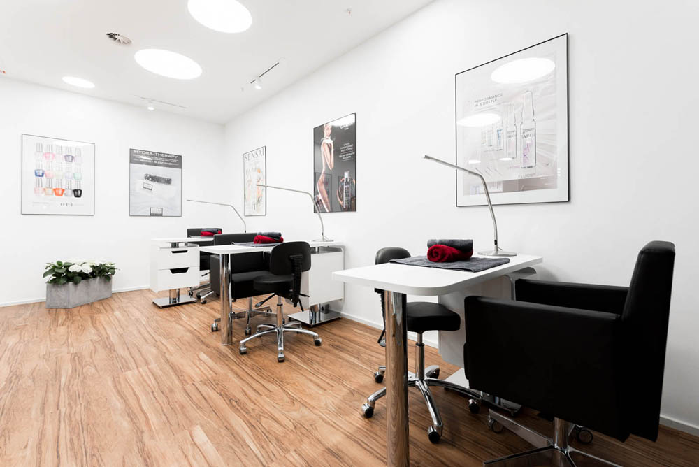 Modern spa treatment room with premium Gharieni equipment and sleek design.